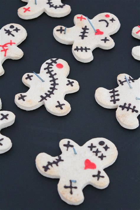 Elevate Your Halloween Spread with Witchcraft Doll Cookies Made Using a Cookie Cutter